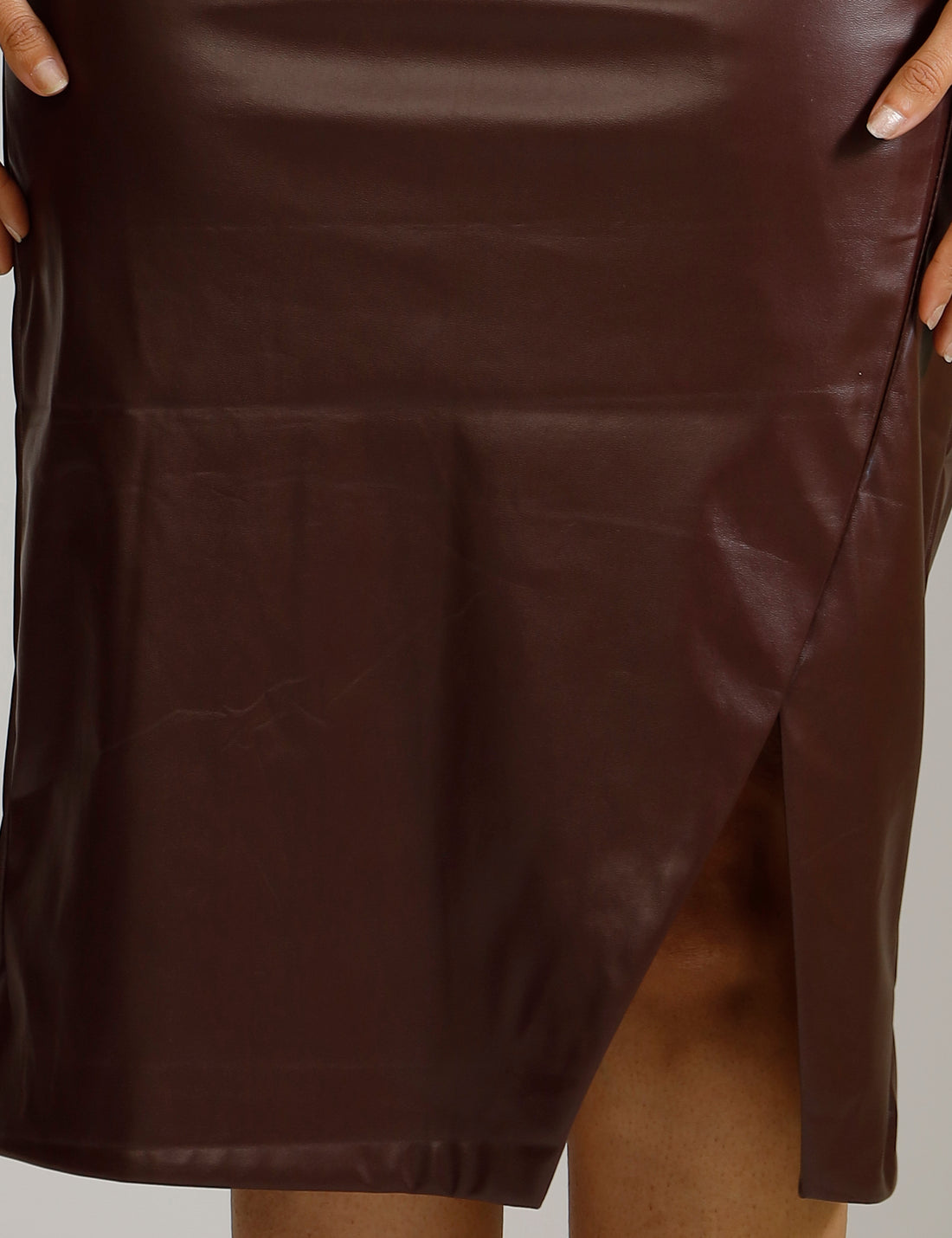 Satin shirt and leather skirt